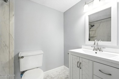 Welcome to this stylish and move-in-ready 2-bedroom, 2-bathroom on Daytona Beach Golf Club in Florida - for sale on GolfHomes.com, golf home, golf lot