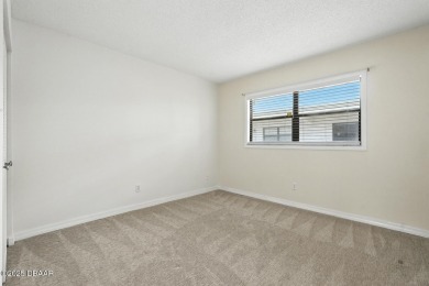 Welcome to this stylish and move-in-ready 2-bedroom, 2-bathroom on Daytona Beach Golf Club in Florida - for sale on GolfHomes.com, golf home, golf lot