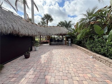 Enjoy sweeping panoramic views from this exceptional 3,031 sq ft on St. Lucie Trail Golf Club in Florida - for sale on GolfHomes.com, golf home, golf lot