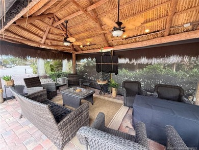 Enjoy sweeping panoramic views from this exceptional 3,031 sq ft on St. Lucie Trail Golf Club in Florida - for sale on GolfHomes.com, golf home, golf lot