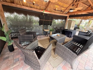 Enjoy sweeping panoramic views from this exceptional 3,031 sq ft on St. Lucie Trail Golf Club in Florida - for sale on GolfHomes.com, golf home, golf lot