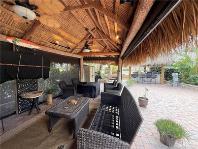 Enjoy sweeping panoramic views from this exceptional 3,031 sq ft on St. Lucie Trail Golf Club in Florida - for sale on GolfHomes.com, golf home, golf lot