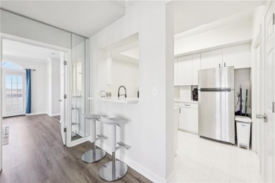 Beautiful end unit condo, fully furnished, and ready for on Bobby Jones Golf Club in Georgia - for sale on GolfHomes.com, golf home, golf lot