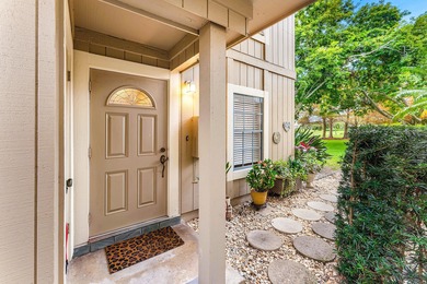 Immaculate first floor end-unit townhome showcasing tranquil on Riverbend Golf Club in Florida - for sale on GolfHomes.com, golf home, golf lot