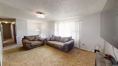 Don't Miss this corner lot beauty! Walking distance from on Paradise Valley Country Club in Wyoming - for sale on GolfHomes.com, golf home, golf lot