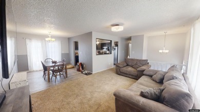 Don't Miss this corner lot beauty! Walking distance from on Paradise Valley Country Club in Wyoming - for sale on GolfHomes.com, golf home, golf lot