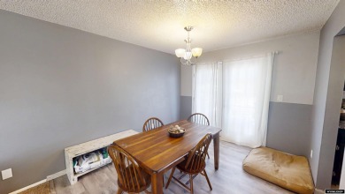 Don't Miss this corner lot beauty! Walking distance from on Paradise Valley Country Club in Wyoming - for sale on GolfHomes.com, golf home, golf lot