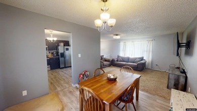 Don't Miss this corner lot beauty! Walking distance from on Paradise Valley Country Club in Wyoming - for sale on GolfHomes.com, golf home, golf lot
