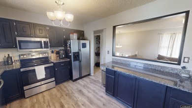 Don't Miss this corner lot beauty! Walking distance from on Paradise Valley Country Club in Wyoming - for sale on GolfHomes.com, golf home, golf lot