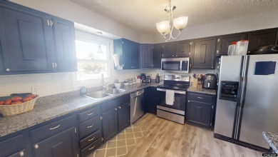 Don't Miss this corner lot beauty! Walking distance from on Paradise Valley Country Club in Wyoming - for sale on GolfHomes.com, golf home, golf lot