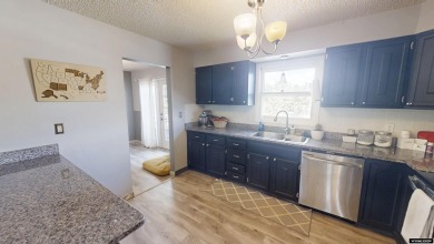 Don't Miss this corner lot beauty! Walking distance from on Paradise Valley Country Club in Wyoming - for sale on GolfHomes.com, golf home, golf lot