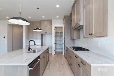 The Birkdale built by Tresidio Homes. The great room features on Falcon Crest Golf Club in Idaho - for sale on GolfHomes.com, golf home, golf lot