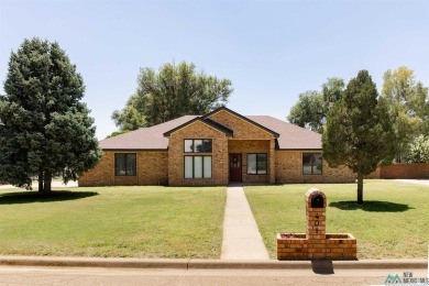 This beautiful four-bedroom home, located on a spacious circle on Chaparral Country Club in New Mexico - for sale on GolfHomes.com, golf home, golf lot