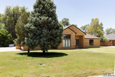 This beautiful four-bedroom home, located on a spacious circle on Chaparral Country Club in New Mexico - for sale on GolfHomes.com, golf home, golf lot
