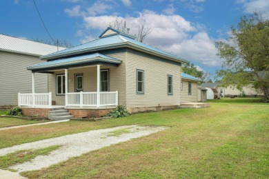 This beautifully redone 3-bedroom, 1-bathroom home offers modern on Nashua Town and Country Club in Iowa - for sale on GolfHomes.com, golf home, golf lot