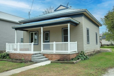 This beautifully redone 3-bedroom, 1-bathroom home offers modern on Nashua Town and Country Club in Iowa - for sale on GolfHomes.com, golf home, golf lot