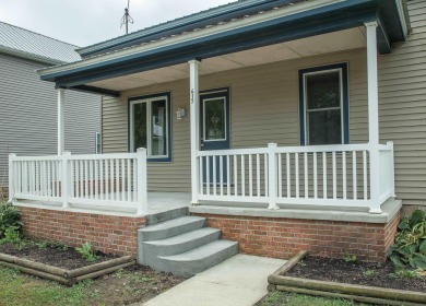 This beautifully redone 3-bedroom, 1-bathroom home offers modern on Nashua Town and Country Club in Iowa - for sale on GolfHomes.com, golf home, golf lot