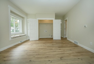 This beautifully redone 3-bedroom, 1-bathroom home offers modern on Nashua Town and Country Club in Iowa - for sale on GolfHomes.com, golf home, golf lot