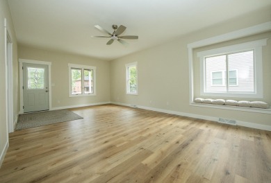 This beautifully redone 3-bedroom, 1-bathroom home offers modern on Nashua Town and Country Club in Iowa - for sale on GolfHomes.com, golf home, golf lot