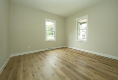 This beautifully redone 3-bedroom, 1-bathroom home offers modern on Nashua Town and Country Club in Iowa - for sale on GolfHomes.com, golf home, golf lot