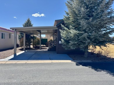 Come check this corner lot property out! This park model has on Juniper Ridge R.V. Golf Resort in Arizona - for sale on GolfHomes.com, golf home, golf lot