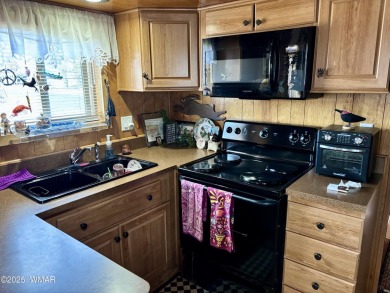 Come check this corner lot property out! This park model has on Juniper Ridge R.V. Golf Resort in Arizona - for sale on GolfHomes.com, golf home, golf lot