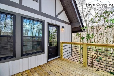 TOTAL RENOVATION A-FRAME ON BEECH MOUNTAIN. This cute 3 bedroom on Beech Mountain Club in North Carolina - for sale on GolfHomes.com, golf home, golf lot