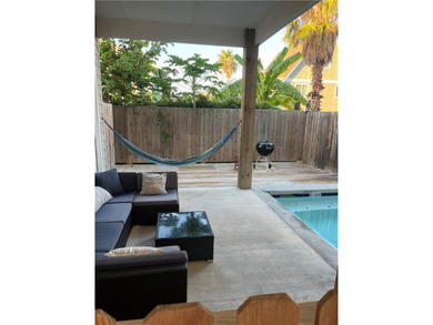 Beach Bliss in Port Aransas - 3BR/2.5BA Surf Bungalow with on Palmilla Beach Golf Club in Texas - for sale on GolfHomes.com, golf home, golf lot