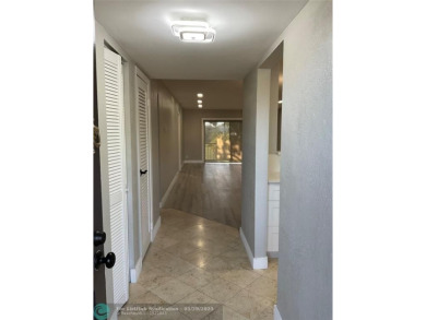 This beautifully remodeled condo in a gated community provides on Inverrary Country Club in Florida - for sale on GolfHomes.com, golf home, golf lot
