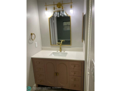 This beautifully remodeled condo in a gated community provides on Inverrary Country Club in Florida - for sale on GolfHomes.com, golf home, golf lot