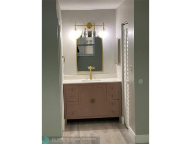 This beautifully remodeled condo in a gated community provides on Inverrary Country Club in Florida - for sale on GolfHomes.com, golf home, golf lot