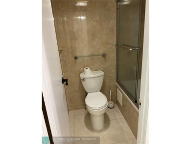 This beautifully remodeled condo in a gated community provides on Inverrary Country Club in Florida - for sale on GolfHomes.com, golf home, golf lot
