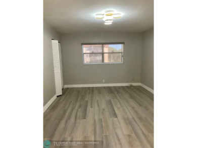 This beautifully remodeled condo in a gated community provides on Inverrary Country Club in Florida - for sale on GolfHomes.com, golf home, golf lot