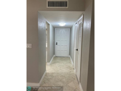 This beautifully remodeled condo in a gated community provides on Inverrary Country Club in Florida - for sale on GolfHomes.com, golf home, golf lot