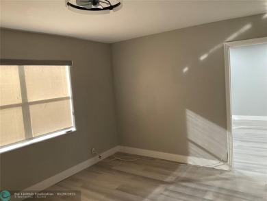 This beautifully remodeled condo in a gated community provides on Inverrary Country Club in Florida - for sale on GolfHomes.com, golf home, golf lot