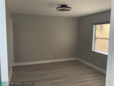 This beautifully remodeled condo in a gated community provides on Inverrary Country Club in Florida - for sale on GolfHomes.com, golf home, golf lot