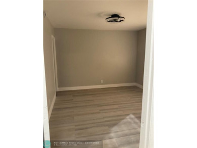 This beautifully remodeled condo in a gated community provides on Inverrary Country Club in Florida - for sale on GolfHomes.com, golf home, golf lot