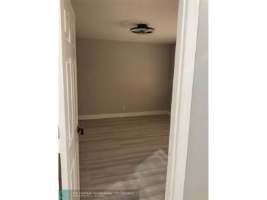 This beautifully remodeled condo in a gated community provides on Inverrary Country Club in Florida - for sale on GolfHomes.com, golf home, golf lot
