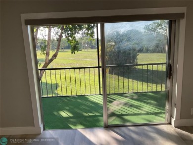 This beautifully remodeled condo in a gated community provides on Inverrary Country Club in Florida - for sale on GolfHomes.com, golf home, golf lot