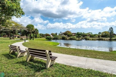 This beautifully remodeled condo in a gated community provides on Inverrary Country Club in Florida - for sale on GolfHomes.com, golf home, golf lot