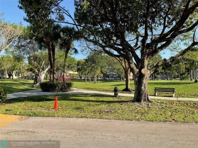 This beautifully remodeled condo in a gated community provides on Inverrary Country Club in Florida - for sale on GolfHomes.com, golf home, golf lot