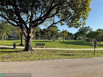 This beautifully remodeled condo in a gated community provides on Inverrary Country Club in Florida - for sale on GolfHomes.com, golf home, golf lot