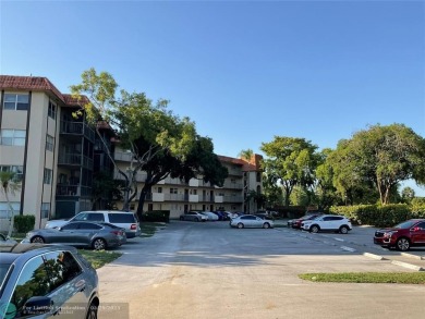 This beautifully remodeled condo in a gated community provides on Inverrary Country Club in Florida - for sale on GolfHomes.com, golf home, golf lot