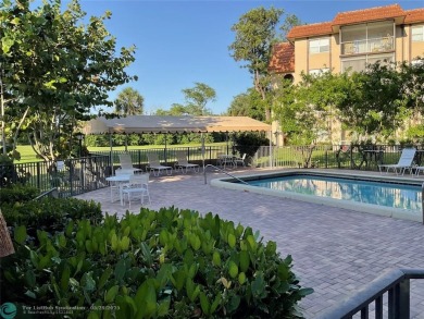 This beautifully remodeled condo in a gated community provides on Inverrary Country Club in Florida - for sale on GolfHomes.com, golf home, golf lot