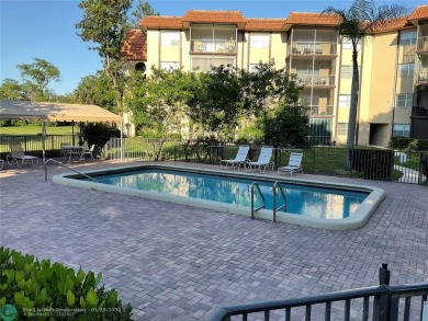 This beautifully remodeled condo in a gated community provides on Inverrary Country Club in Florida - for sale on GolfHomes.com, golf home, golf lot