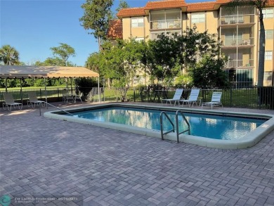 This beautifully remodeled condo in a gated community provides on Inverrary Country Club in Florida - for sale on GolfHomes.com, golf home, golf lot