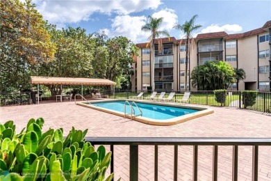 This beautifully remodeled condo in a gated community provides on Inverrary Country Club in Florida - for sale on GolfHomes.com, golf home, golf lot