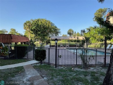 This beautifully remodeled condo in a gated community provides on Inverrary Country Club in Florida - for sale on GolfHomes.com, golf home, golf lot