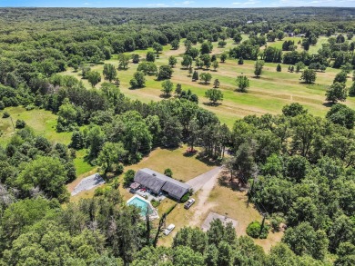 Welcome to the Estate of Pete Moreno, Legendary Gibson Guitar on Ridgeview Golf Course in Michigan - for sale on GolfHomes.com, golf home, golf lot