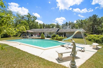 Welcome to the Estate of Pete Moreno, Legendary Gibson Guitar on Ridgeview Golf Course in Michigan - for sale on GolfHomes.com, golf home, golf lot